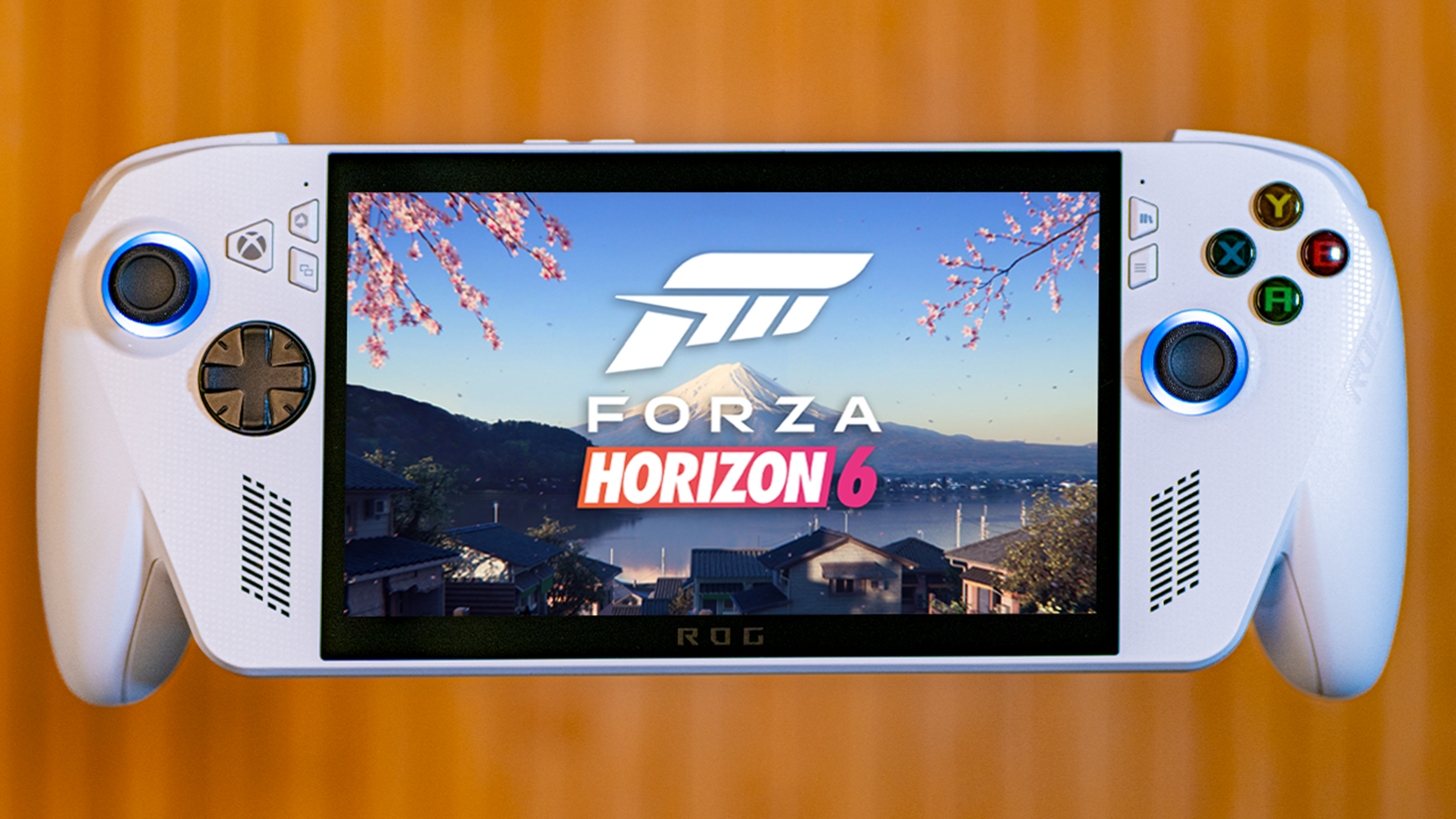 White ROG Xbox Ally displaying Forza Horizon 6